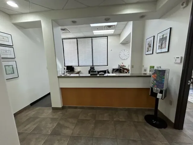 Front desk and lounge seating at Desert Willow Dental