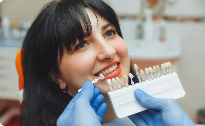 Patient receiving cosmetic dental care