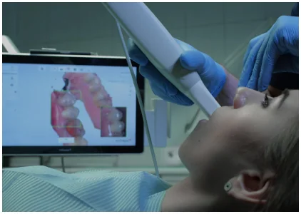 Patient receiving 3D dental imaging